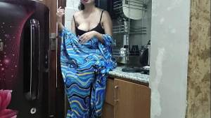 Indian stepmom watches and enters her stepson’s Kitchen to fuck him
