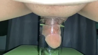 Dipping cock in a clear glass with water and see how it zoom in and gets bigger