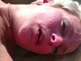 Mature Blonde Masturbating at the Beach