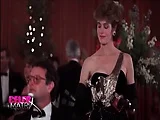 Sean Young making out with a guy in a car with her nipple