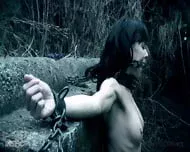 Brunette In Shackles