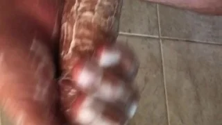 Soapy cock stroking in the shower